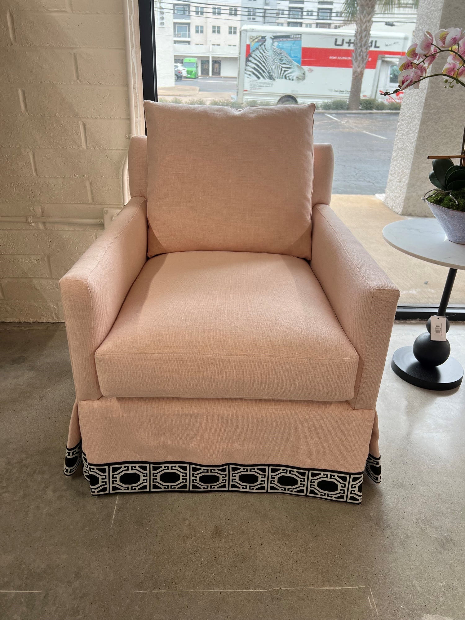 Custom Blush Swivel Chair with Thibaut Black & White Skirt Trim