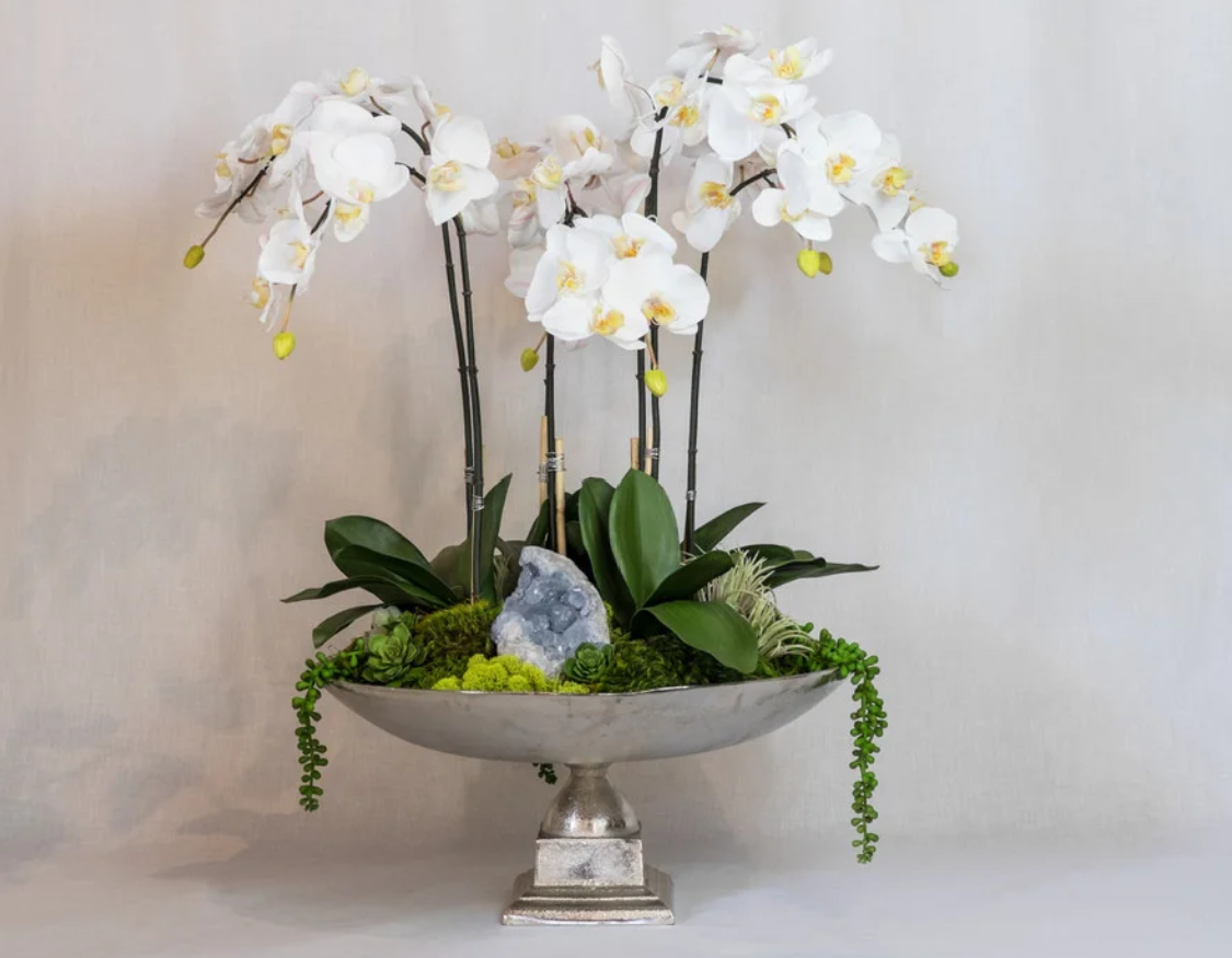 Cascading White Orchid Arrangement in Silver Urn with Blue Celestite Accent