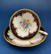 Vintage Tuscan Cup & Saucer – Black, White & Gold Floral Pattern