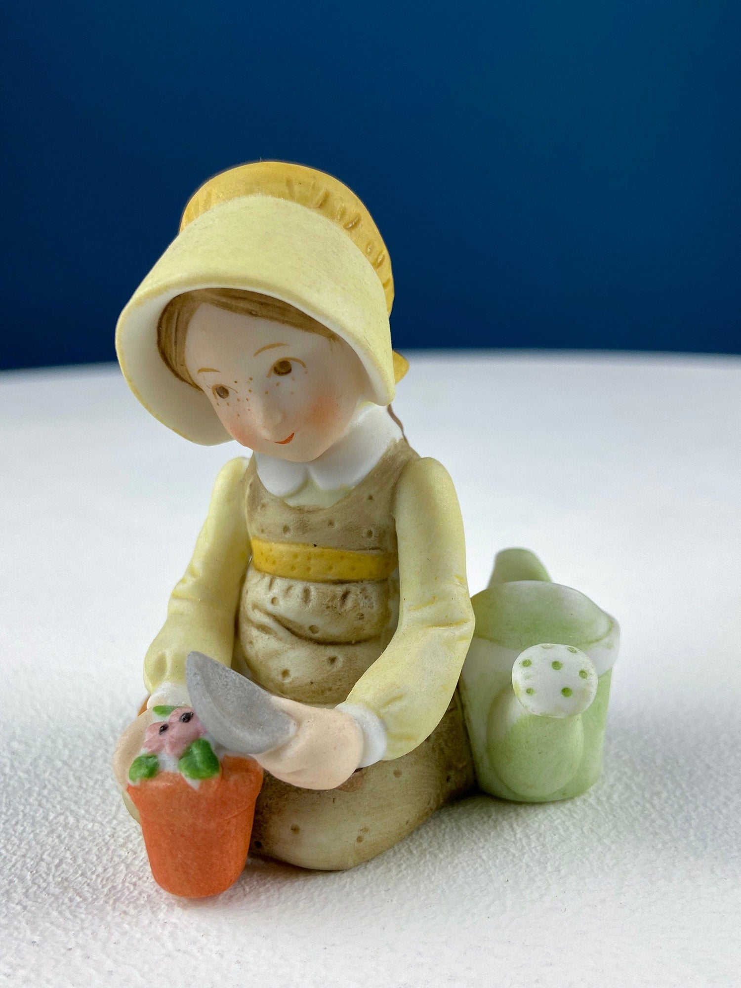 Marks & Rosenfeld Porcelain Figurine – Little Girl Planting Flowers with Birds in Nest
