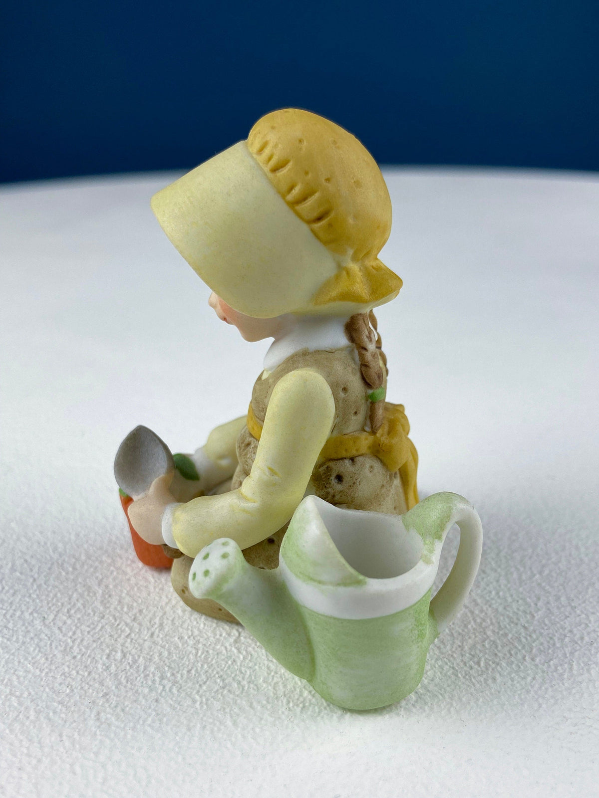 Marks & Rosenfeld Porcelain Figurine – Little Girl Planting Flowers with Birds in Nest