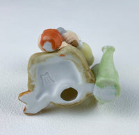 Marks & Rosenfeld Porcelain Figurine – Little Girl Planting Flowers with Birds in Nest