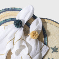 Straw Pompom Napkin Rings – Indigo (Set of 4)